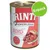 Rinti Kennerfleisch mit Rind getreidefrei, Enpack. Bild på konservburk med nötköttsbitar och grönsaker på etiketten. Text på tyska. Rinti Kennerfleisch mit Rind getreidefrei, Enpack. Bild på konservburk med nötköttsbitar och grönsaker på etiketten. Text på tyska.