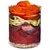 Glass container with visible layers of raw beef chunks, organ meat, courgette spirals, apple slices, grated carrot, apricot halves and brown rice at the bottom. No brand or text shown.