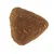 Close-up of a single triangular piece of dry pet food kibble.