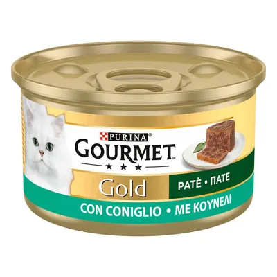 Scatoletta Purina Gourmet Gold paté con coniglio, immagine di gatto bianco e porzione di paté su piatto, testo visibile: 'PATÉ', 'CON CONIGLIO'.