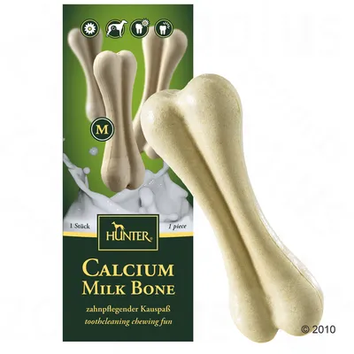 HUNTER Calcium Milk Bone, 1 Stück, M. Tekst: zahnpflegender Kauspaß, toothcleaning chewing fun. Billede af et lyst tyggeben foran emballage med samme produkt.