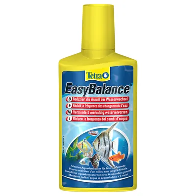 Tetra EasyBalance, flacon jaune. Texte visible : Réduit la fréquence des changements d'eau. Maintient l'eau propre en aquarium jusqu'à 6 mois. Illustrations de poissons tropicaux.