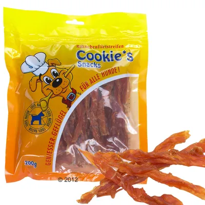 Förpackning med Cookie's Snacks Hähnchenfiletstreifen, 200 g. Text på tyska: Für alle Hunde!, 100% Natur, Geflügel. Hundsnacks synliga utanför förpackningen.