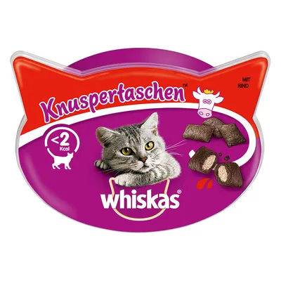 Whiskas Knuspertaschen, naudanlihaa, alle 2 kcal per pala. Kuvassa kissan kasvot ja täytettyjä makupaloja. Teksti saksaksi: Knuspertaschen, mit Rind.