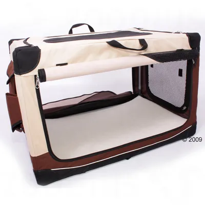 Foldable soft-sided pet crate in beige and brown fabric with mesh windows, zip openings, carry handles and side pockets. No visible brand or text.