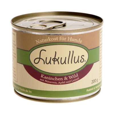 Burk med Lukullus hundmat, text: Naturkost für Hunde, Kaninchen & Wild mit Naturreis, Apfel und Leinöl, 200 g. Synlig metallförpackning.