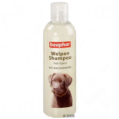 beaphar Welpen Shampoo bottle with puppy image, visible text: Fell-Glanz MIT MACADAMIAÖL. Text in German.