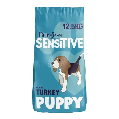 12.5kg bag labelled Sensitive, rich in turkey, puppy. Features illustration of a dog and highlights suitability for sensitive needs.