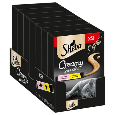 Sheba Creamy Snacks x9, confezione multipla da 7 scatole, 756 g totali. Visibili varianti: mit Lachs, mit Huhn. Immagine di un gatto grigio sul fronte.