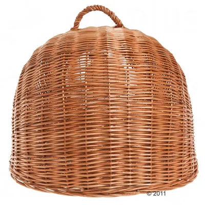 Wicker basket with a rounded dome shape and a handle on top, suitable for carrying or storing items.