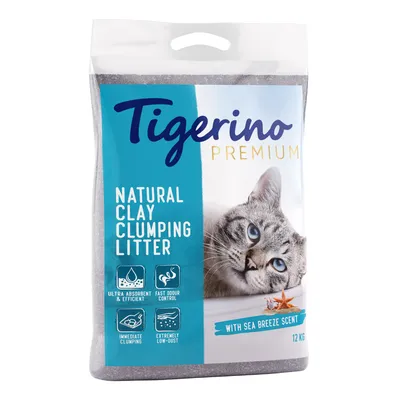 Опаковка Tigerino Premium Natural Clay Clumping Litter, 12 кг, с изображение на котка. Видим текст: Ultra absorbent & efficient, Fast odour control, Immediate clumping, Extremely low-dust.
