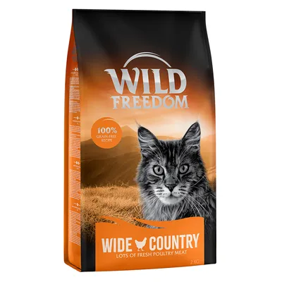 Wild Freedom Wide Country kattenvoer, 100% graanvrij recept, lots of fresh poultry meat, verpakking van 2 kg met afbeelding van kat op oranje achtergrond.