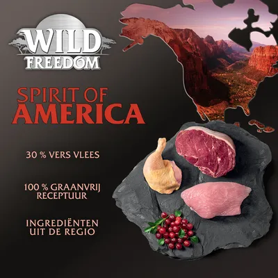 Wild Freedom Spirit of America, 30% vers vlees, 100% graanvrij receptuur, ingrediënten uit de regio. Afbeelding van rauw vlees, gevogelte en bessen op leisteen.
