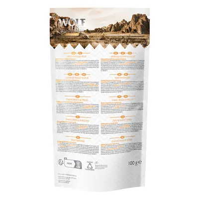 Hrbtna stran embalaže Wolf of Wilderness Training, vidno besedilo 'Fresh chicken meat' v več jezikih, teža 100 g, simboli za recikliranje in plastiko.