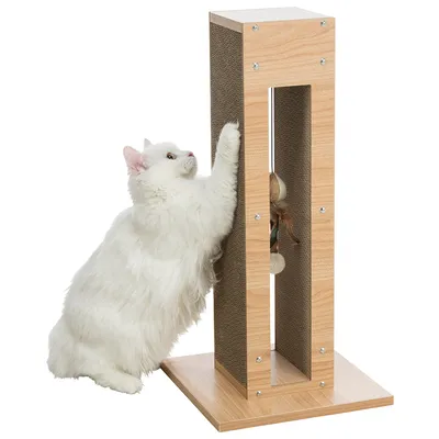 White cat scratching a scratching furniture made of wood with cardboard insert and integrated toy. Product for keeping cats occupied and caring for claws.