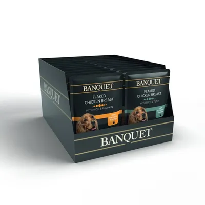 Banquet flaked chicken breast pouches with rice and pumpkin, and rice and tuna. 100% natural topper stated on packaging. Multiple packs displayed in a branded box.