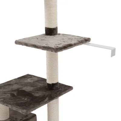 Krabpaal met twee platforms van pluche en sisalstammen, zijdelings bevestigde metalen houder zichtbaar. Krabpaal met twee platforms van pluche en sisalstammen, zijdelings bevestigde metalen houder zichtbaar.