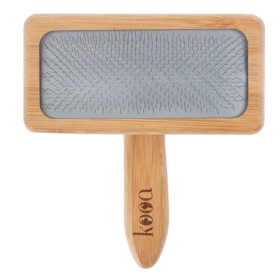 kooa wooden brush with metal bristles, rectangular shape and ergonomic handle.