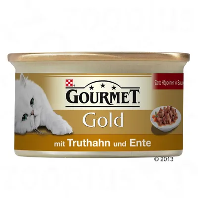 Lata de comida para gatos Gourmet Gold mit Truthahn und Ente, com imagem de um gato branco e pedaços de carne em molho no rótulo.