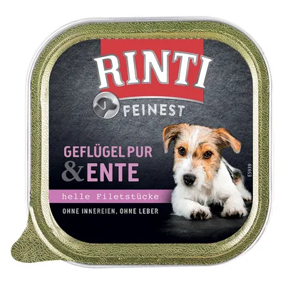 Envase de comida para perros Rinti Feinest, texto visible: Geflügel pur & Ente, helle Filetstücke, ohne Innereien, ohne Leber. Imagen parcial de un perro en la esquina inferior derecha.