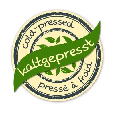 cold-pressed, kaltgepresst, pressé à froid – tekst na znaku informującym o tłoczeniu na zimno. Tekst w języku angielskim, niemieckim i francuskim.