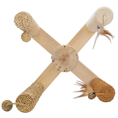 Wooden toy in X-shape with sisal ropes and feathers at the ends, suitable for scratching and play activities.