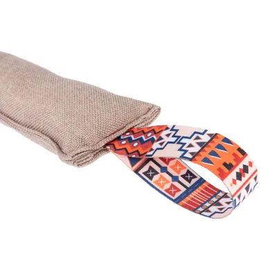 Beige fabric toy with colourful band in ethnic pattern, suitable for pulling or playing.