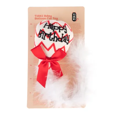 Juguete para gatos Tiaki Bday Balloon con bordado 'Happy Birthday', lazo rojo y plumas blancas.