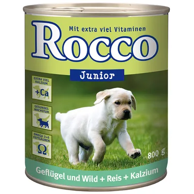 Lata de 800 g de Rocco Junior. Texto visível: Mit extra viel Vitaminen, Extra viel Kalzium +Ca, Gesundes Wachstum, Omega 3+6 Fettsäuren, Geflügel und Wild + Reis + Kalzium.
