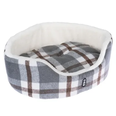 Round pet bed with grey-white-brown check pattern and soft white inner padding. Trixi brand logo visible on the outside.