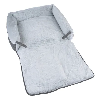 Graues, weiches Hundebett mit ausklappbarer Liegefläche und erhöhtem Rand. Material: Plüsch und Stoff.