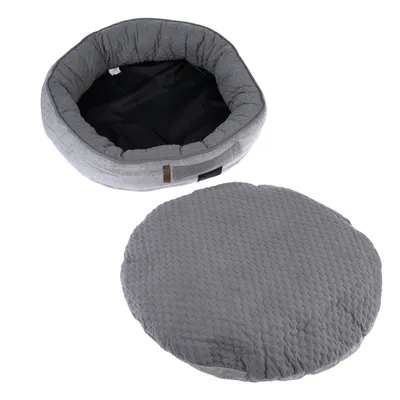 Rundes, graues Haustierbett mit abnehmbarem, gepolstertem Kissen. Aussenmaterial aus Stoff, Innenbereich schwarz.