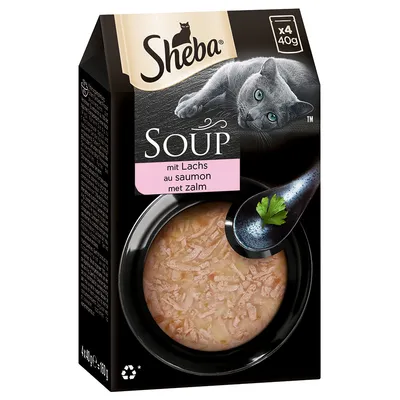Sheba Soup mit Lachs, pakiranje 4×40 g. Prikazana zdjelica s juhom i žlicom, tekst na ambalaži na njemačkom, francuskom i nizozemskom jeziku.