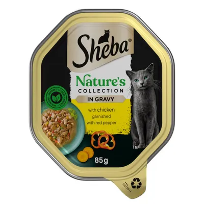 Sheba Nature's Collection In Gravy, with chicken garnished with red pepper, 85g. Image shows food portion and ingredient highlights.