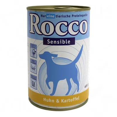 Rocco Sensible dog food tin, 400g, visible text: 'Nur eine tierische Proteinquelle', 'Huhn & Kartoffel'. Blue silhouette of a dog on label. Some text in German.