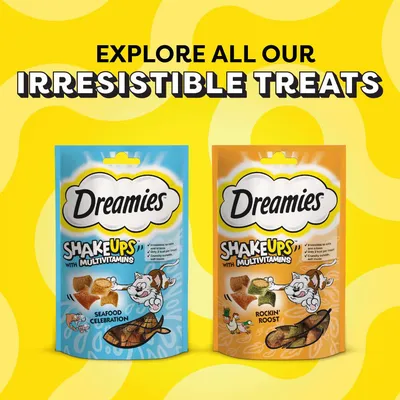 Dreamies ShakeUps with Multivitamins treats in Seafood Celebration and Rockin' Roost flavours. Text: Explore all our irresistible treats.