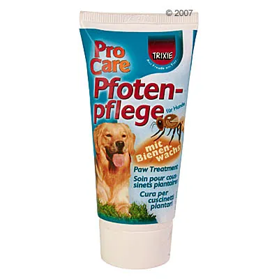 Tuba Trixie Pro Care Pfotenpflege za nego pasjih tačk, z napisom 'mit Bienenwachs', slika psa in čebele. Besedilo v več jezikih: Paw Treatment, Soin pour coussinets plantaires.