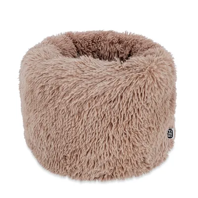 Rundes, flauschiges Haustierbett in beige mit weicher Oberfläche und sichtbarem Markenetikett von Trixie.