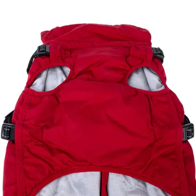 Zaino rosso per pet con aperture imbottite per le zampe e fibbie regolabili.