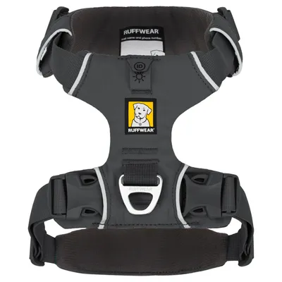 Ruffwear dog harness in grey with reflective stripes, ID pocket and sturdy buckles. Logo with yellow background and dog image visible.