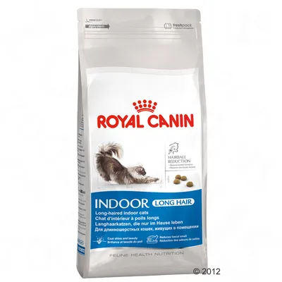 Saco de pienso Royal Canin Indoor Long Hair para gatos de interior de pelo largo. Texto visible: Hairball Reduction, brillo del pelaje, reducción de bolas de pelo y heces olorosas.