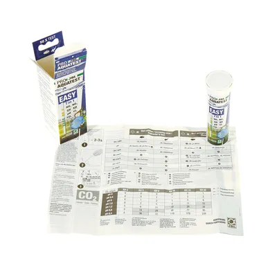 JBL ProAquaTest Easy 7in1 do analizy wody. Opakowanie, pojemnik na paski testowe i instrukcja z tabelami do oznaczania CO2 oraz parametrów wody: pH, KH, GH, NO2, NO3, Cl.