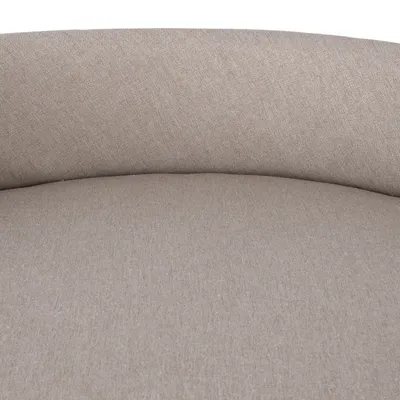 Close-up van beige gevoerd textielmateriaal, mogelijk onderdeel van een huisdierenbed of bank.