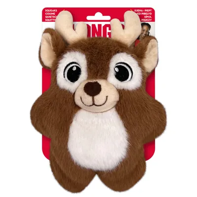 Plush toy in reindeer shape with brown fur, white belly and large eyes. Packaging shows 'Squeaks' and multilingual notes on squeaker function.