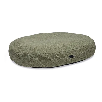 Coussin rond pour animal, tissu effet laine bouclée vert kaki, sans motifs ni marques visibles.