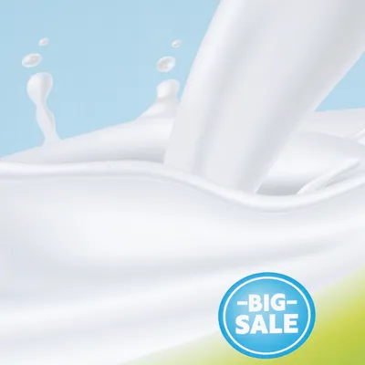 Reklama s nápisem 'Big Sale' na modrém pozadí a mléčnou stříkancí v popředí.