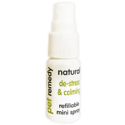Natural de-stress and calming refillable mini spray bottle with pet remedy text visible on label.