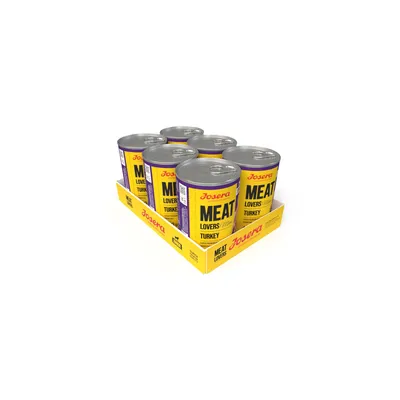 Josera Meat Lovers Turkey, žltý podnos so šiestimi konzervami. Názov produktu a značka viditeľné na obale.
