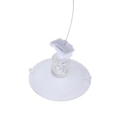 Ventouse ronde transparente avec crochet en plastique blanc et fil métallique, vue de dessus. Aucun texte ou marque visible.