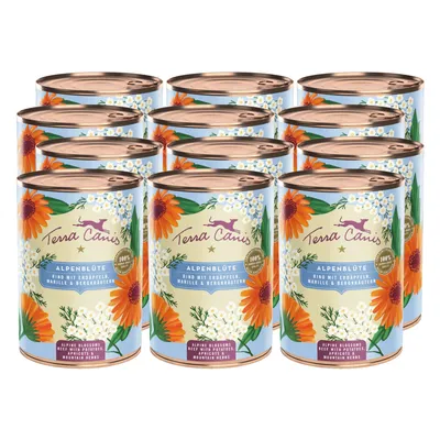 Lot de 12 boîtes Terra Canis Alpenblüte, texte visible : Rind mit Erdäpfeln, Marille & Bergkräutern, 100 % naturbelassen. Illustration de fleurs sur l’emballage.
